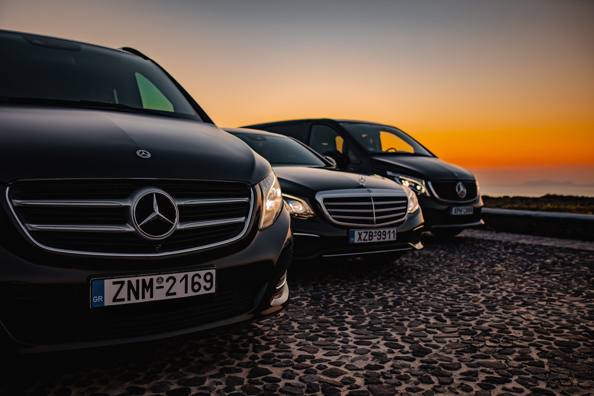 Santorini Imperial Mercedes-Benz van at sunset